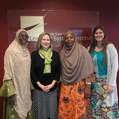 Professors Amina Adamu (left) and Aisha Umar Tsiga (second right) of BUK, with Stephanie Zuilkowski (second left), and Adrienne Barnes (right) of Florida State University, at the Learning Systems Institute on the FSU campus in Tallahassee, Florida.