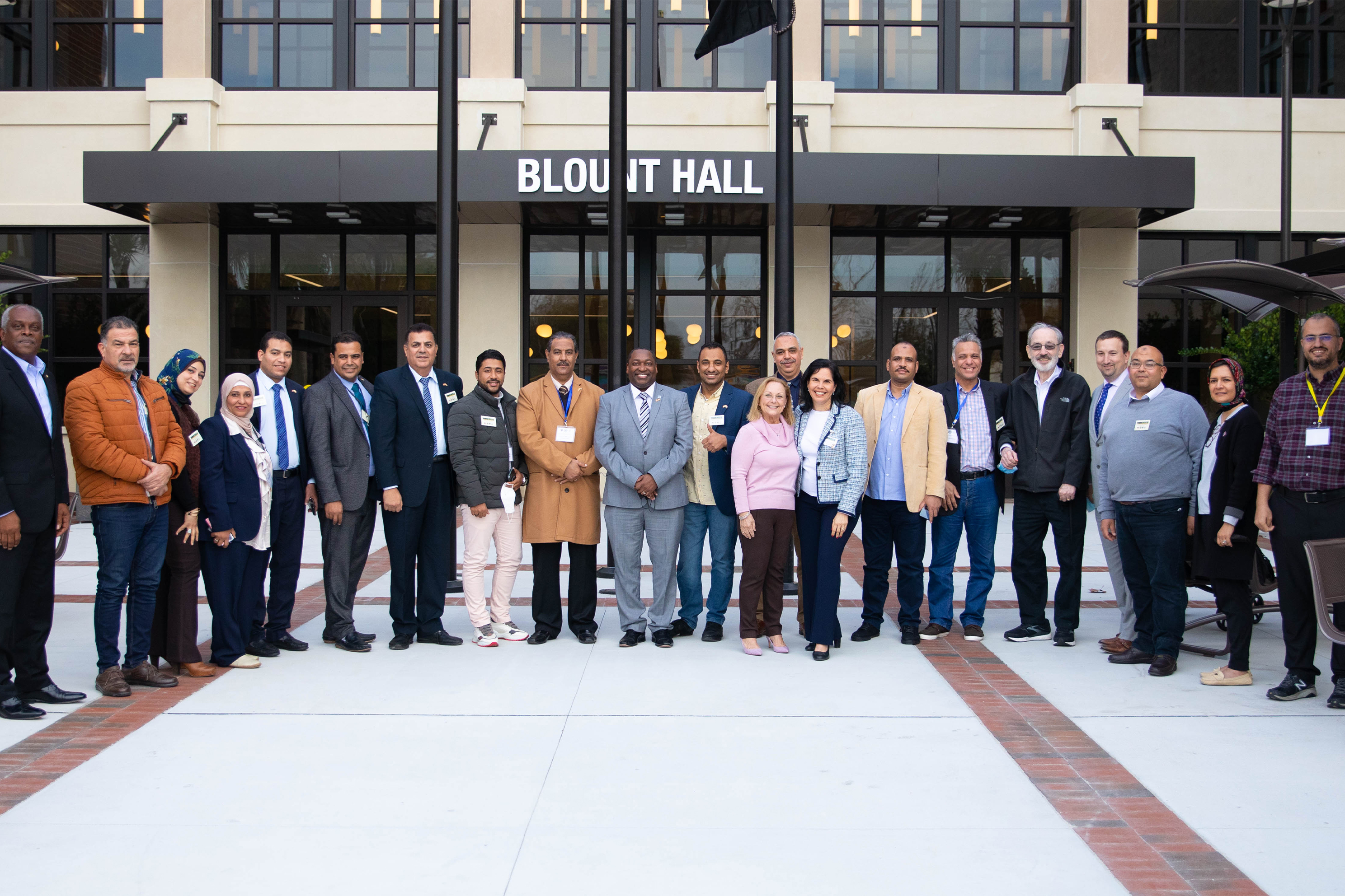 "CCAP group posing in front of Blount Hall"