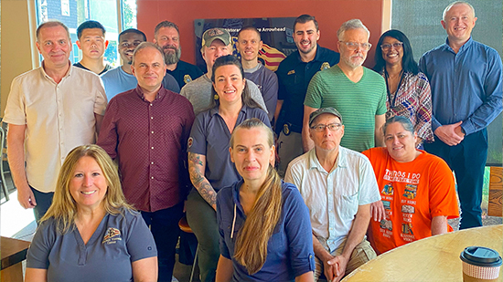 "Four Ukrainian fellows posing with a group from the FSU Students Veterans Center."