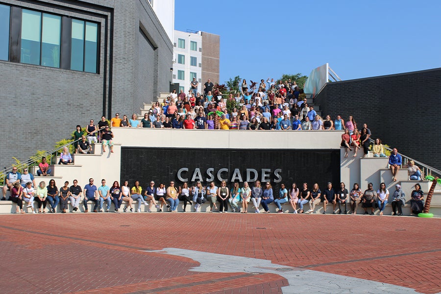 Large group photo taken outside at Tallahassee's Cascades Park