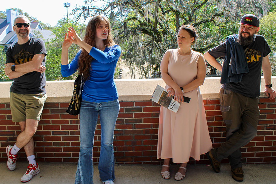 FSU COLLEGE OF MUSIC STUDENT AND TOUR GUIDE OLIVIA LEICHTER talking to DahkaBrakha during the tour. .