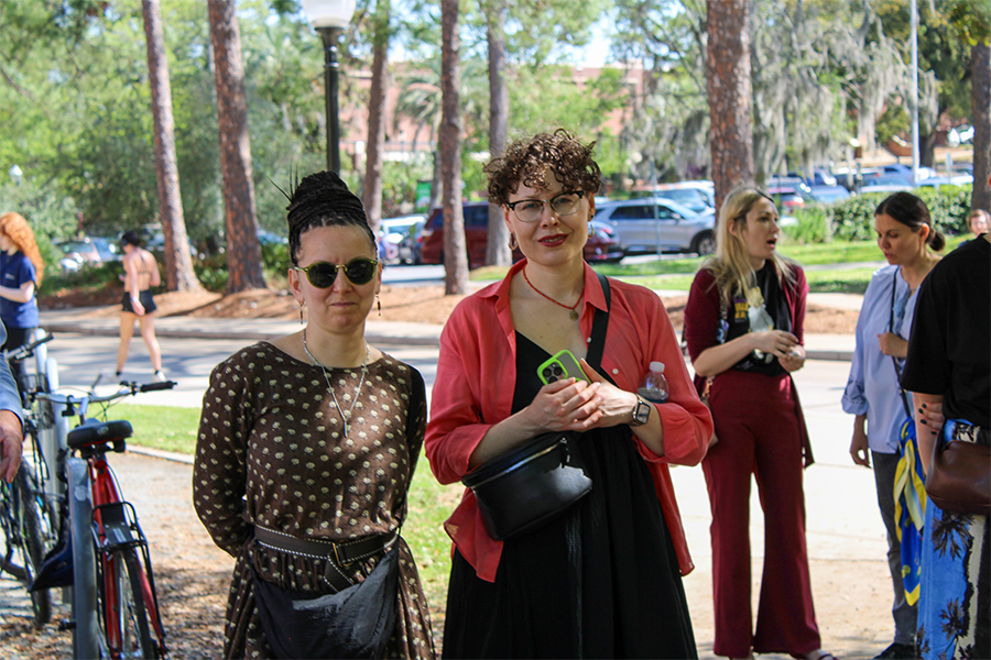 DakhaBrakha walking outdoors on the FSU campus 