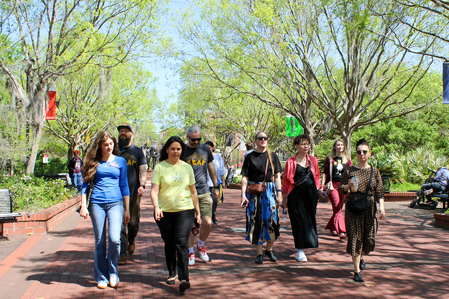 DakhaBrakha walking outdoors on the FSU campus 