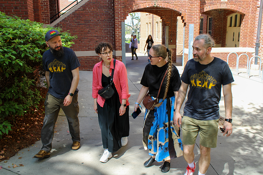 DakhaBrakha walking outdoors on the FSU campus 