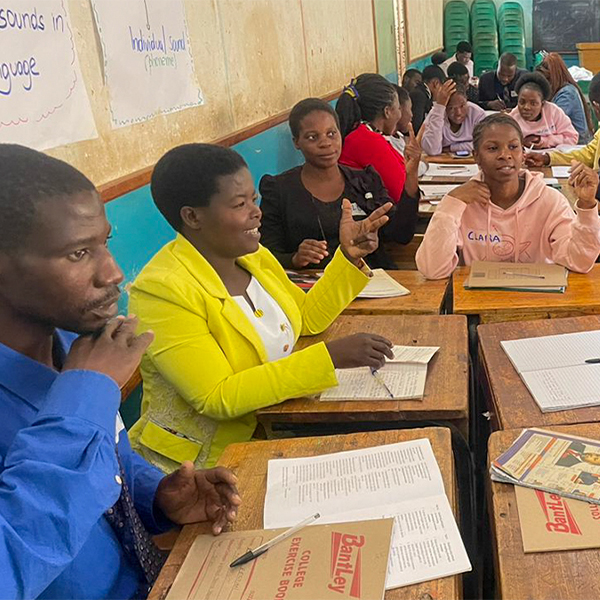 Group of young educators in discussion in Malawi.