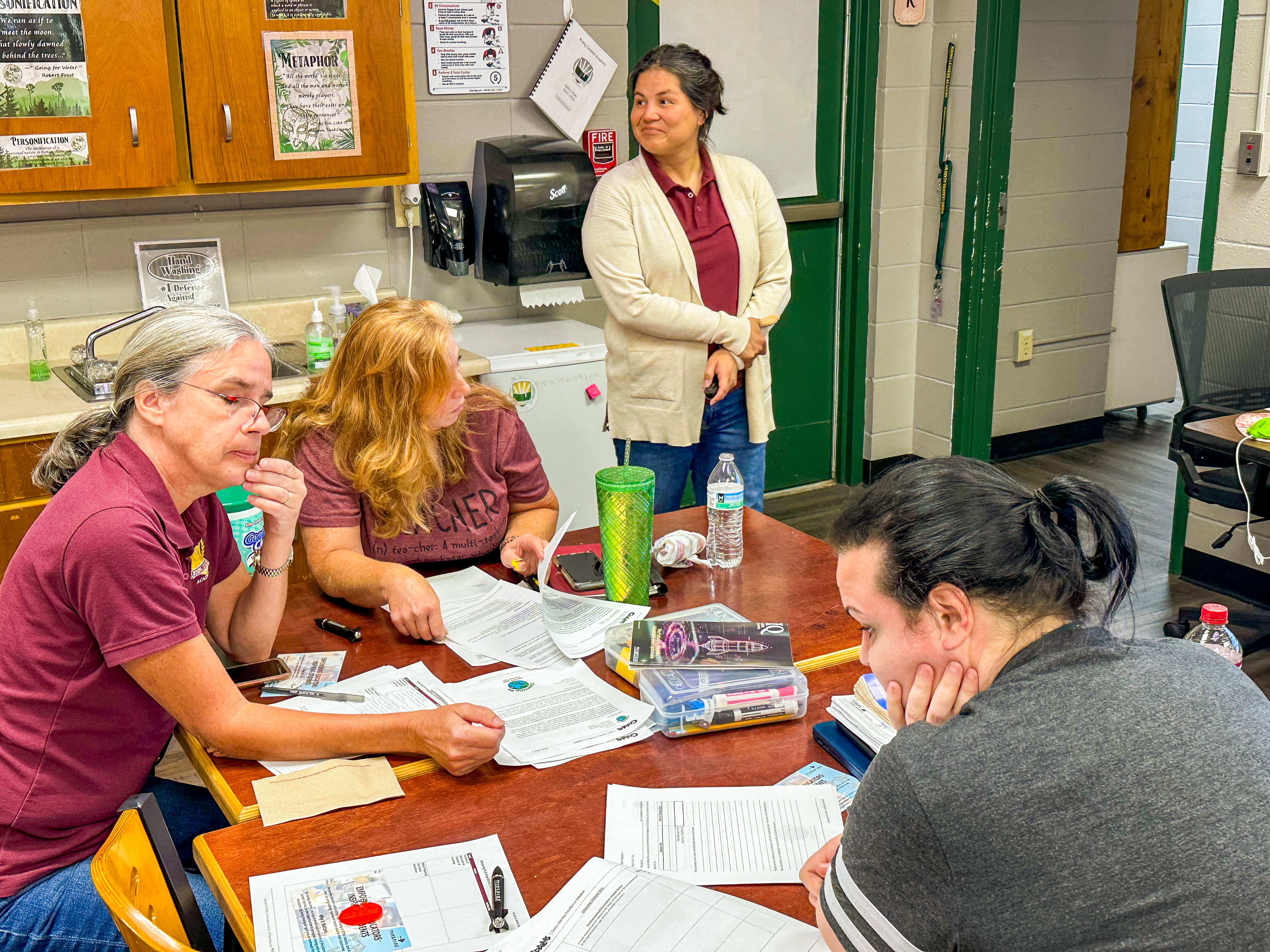 LSI's Zaida McGinley working in a classroom with teachers.