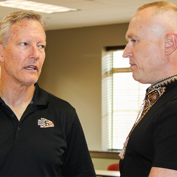 "Dr. Billy Francis and Dr. Andrii Ballendr in discussion."