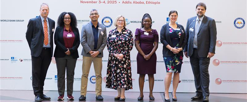 LSI staff members posing for a group photo at the Educators Shaping Futures conference.