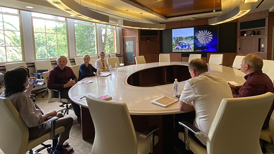 "Four Ukrainian fellows sitting around a conference table meeting with FSU Provost Jim Clark"