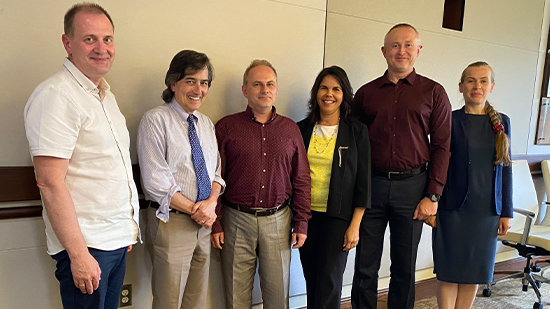 "Four Ukrainian fellows and Dr. Vilma Fuentes pose for a group photo with FSU Provost Jim Clark"