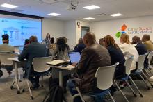 CCAP South Africa group members listening to a presentation inside a classroom  at Career Source Florida.