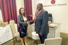 Two people shaking hands