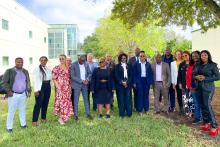 CCAP South Africa group photo outside by a tree with St. Petersburg College