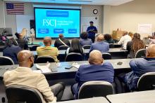CCAP South Africa group members listening to a presentation inside a classroom at Florida State College in Jacksonville 