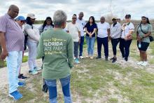 Members of the CCAP South Africa group outside at listening to a presentation about the Florida State Parks