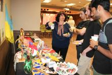 A group of students learning about Vyshyvanka Day from one of the invited guests. 