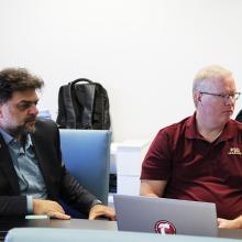 Rabieh Razzouk and Jim Reynolds at a meeting.