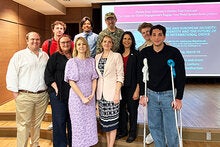 Kateryna Shynkaruk poses for a group photo following her lecture at FSU's Globe Auditorium. 