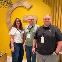 Carrie Meyers, Jim Reynolds and Robert Hanna pose for a photo at Google headquarters.