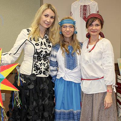 Dr. Anna Romanova poses for a photo with guests at the Vyshyvanka Day celebration.