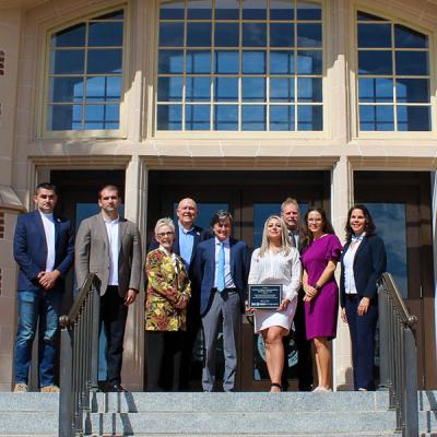 Group photo on the steps of the Westcott Building with the Provost.