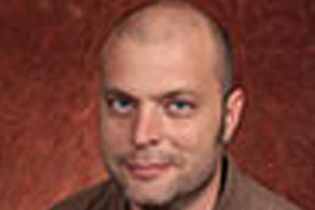 headshot photo of Dr. Nick Cogan