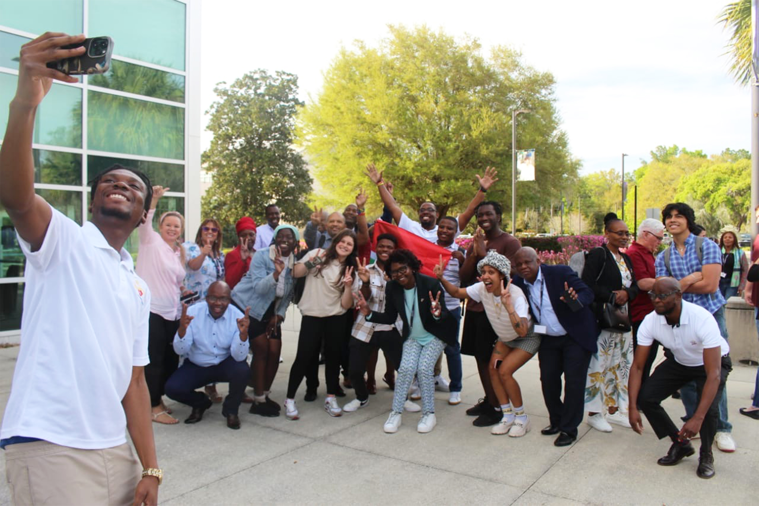 "Members of the CCAP South Africa group taking a selfie outside at Santa Fe College"