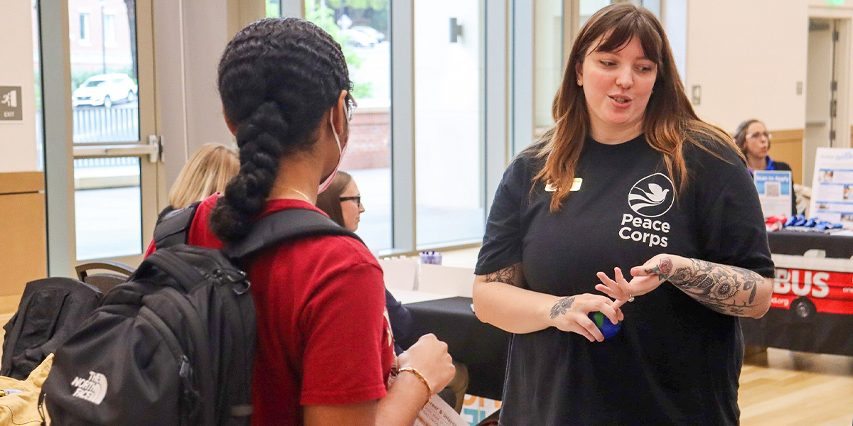 "Maddie Leaman, FSU's Peace Corps contact, meets with an FSU student."