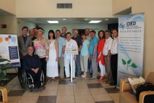 CCAP Ukraine group photo in front of a sign for the Santa Fe  Center for Innovation and Economic Development