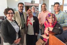 Group of six members of the CCAP Egypt delegation posing with a member of the Santa Fe College staff