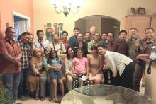 CCAP Indonesia group photo in someone's home. 