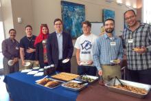 Group of members of the CCAP Egypt delegation getting lunch in a buffet line