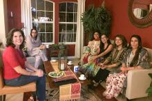 CCAP Pakistan members sitting with Dr. Vilma Fuentes at her home