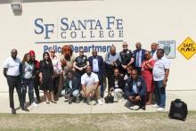 Members of the CCAP South Africa group taking a group photo at the Santa Fe College Police Department