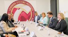  UN General Assembly President Dennis Francis in a meeting with his colleagues and LSI leadership.