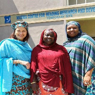 Ana Marty, an LSI research faculty member, at Bayero University in Kano, Nigeria, with university faculty members Talatu Musa Garba and Amina Adamu.