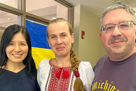 Lisa Wakamiya and Robert Romanchuk with Nataliia Safonova